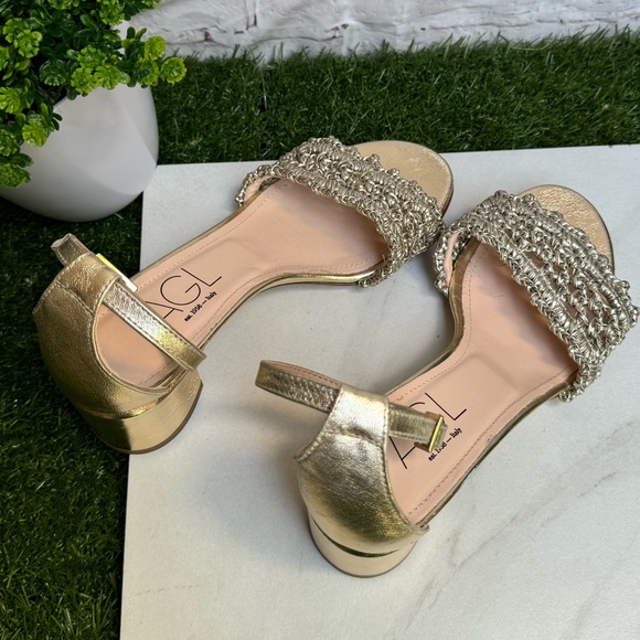 AGL
Crochet Penny Block Heel Sandal in Golden Platino color size 36.5 US 6.5 - Picture 9 of 14